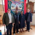 Nick Malyan (Redhills) Sud Basu (Ensemble 84), Paulina Malefane (Isango Ensemble), Mark Donford May (Ensemble 84_Isango Ensemble) with Horden banner