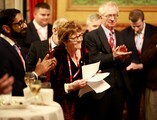 Vivien Jones MBE surrounded by her guests at a recent reception.