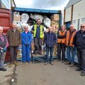 The TWAM Ipswich team after filling a container with tools destined for Uganda.