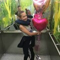 Lola smiling as she leaves Sheffield Children’s Hospital after her surgery