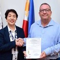 PEZA official signing Maria Veronica F. Magsino (Deputy Director General for Policy and Planning) and Jason Tyas (President of Expromet Asia Inc)