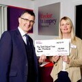 John Murphy, managing director for Taylor Wimpey Yorkshire, with Laura Leverton from The Sick Children
