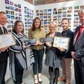 Representatives from the community of Bellsbank accept the 2019 My Place Awards on behalf of their town. Standing with members of the judging panel.