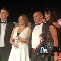 Nicki Pointer and Leigh Westwood collecting the award