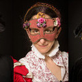Photograph of Passamezzo wearing masks.  Copyright Eric Richmond