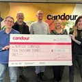 Photo shows Norfolk Clubhouse founder June Webb and trustee Tabby Farrar with Candour directors John Skinner, Mark Williams-Cook and Jessica Bettis