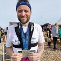 BTA fundraiser Peter Leather with medal for finishing Brighton marathon