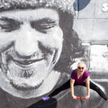 Jenny Belcher, founder of Boogie Bounce, bouncing in front of iconic Nirvana mural