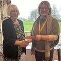 Ladies Captain - Rosemary Sheppard presents cheque to Mary Kahn