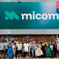 Group shot of the employees at Micom celebrating their GPTW achievement