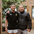 Henwhill with his rugby coach Mr Bronwyn May