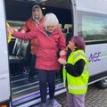 An Age Concern Hampshire passenger assistant helps clients