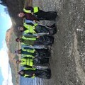 Some of the many volunteers with piles of litter they collected from the shoreline of Loch Lubnaig.