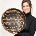 Helen Smith from Hansons auctioneers with rare Staffordshire slipware pottery