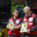 Mayor of Greater Manchester Andy Burnham and Big Issue vendor Colin outside HOME. Credit: Rebecca Lupton