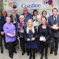 Heroes ahoy! The winners of the Coastline Customers at the Heart awards stand with their trophies. 