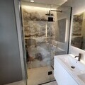 Bespoke frameless glass shower screen design by Lumelle Glass Ltd - 27 years of specialist engineering expertise
