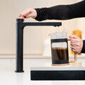 Aquatap Ultimo 6-in-1 boiling water tap in Matt Black finish installed in a modern kitchen