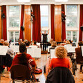 Photograph of the orchestra playing