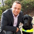 Close up of Dan Williams and his Guide Dog Zodiac