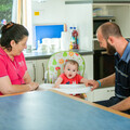 Dad Mark with Acorn House Manager Abi and baby David when the Dean family came back to visit
