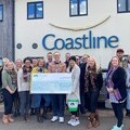 Colleagues at Coastline gather to present Children’s Hospice South West with over £12,400 thanks to their fundraising efforts over the past year