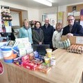 Sam and Alex Scott with volunteers at Hesket Newmarket Community Shop