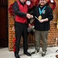Choir Chair Mark Kusionowicz presenting the cheque to the Mayor of Rushmoor, Cllr Calum Stewart.