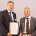 Dr Alastair Leake (right) received his award from Andrew Wraith.