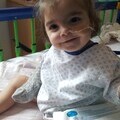 Baby Bella smiling in hospital