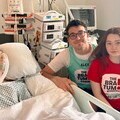 Alex Preston and Hannah in hospital with her brother Alexander