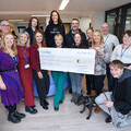 Coastline colleagues and clients gather with StreetVet CEO Zoe Abbotts, StreetVet Volunteer RVN Jayne James and celebrity partner Julia Bradbury