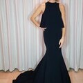 Amanda Holden looked sensational in a stunning black two piece Caroline Castigliano gown