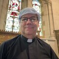 Revd Vince Morris in a knotted handkerchief, Llandudno