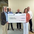 Tim Passingham Cambridge MC Founder and Chairman [left] presenting the cheque to The Ulysses Trust