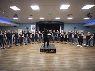 notorious choir in rehearsal. Photo: Adrian Burrows
