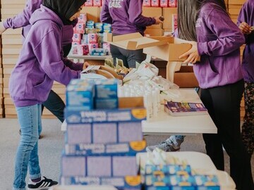Young People packing Self-Care Packs