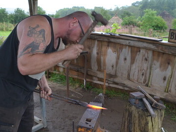 Blacksmith Joe Tyler working on the anvil