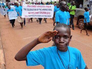 Homeless children marching through Jinja for the International Day for Street Children 3