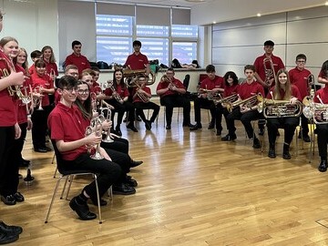 The Redhills Youth Brass Band preparing to perform at Sage Gateshead