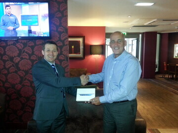 Our business development manager, Tony Grillo, handing over the iPad to Gerry Lafferty.