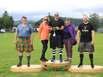 Kyle Randalls Heavyweights Champion 2023 with Murdo Masterson Craig Winslow and supporter Pauline Skea Specsavers Stirling and Games Chieftain Kathryn