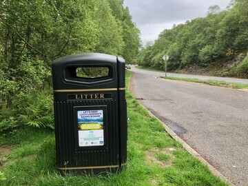 One of the bins located in a layby alongside the A82