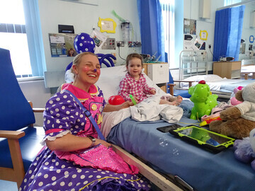Louby Lou visiting Molly in hospital