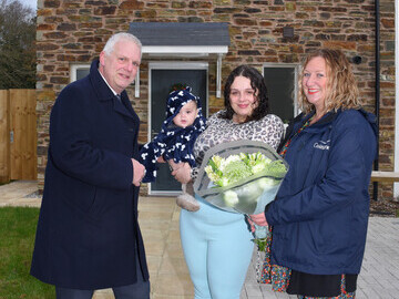 Tarryhn Taylor proudly moves into Coastline’s 5000th home in ownership