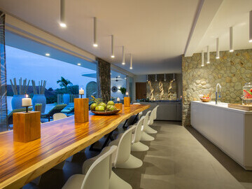 The kitchen is a modern, luxurious, open space for entertaining, and hanging out in groups
