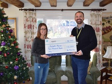 1) Michelle Macrae receiving cheque from Mark Jarman-Howe, CEO of St Helena Hospice