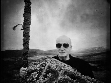 Iain Sinclair, with a sword by Brian Catling. Photograph by Anonymous Bosch.