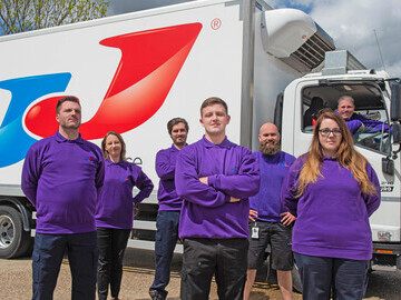 An image of JJ Foodservice drivers and fuel efficient vehicles 