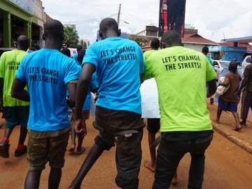 Homeless children marching through Jinja for the International Day for Street Children 4